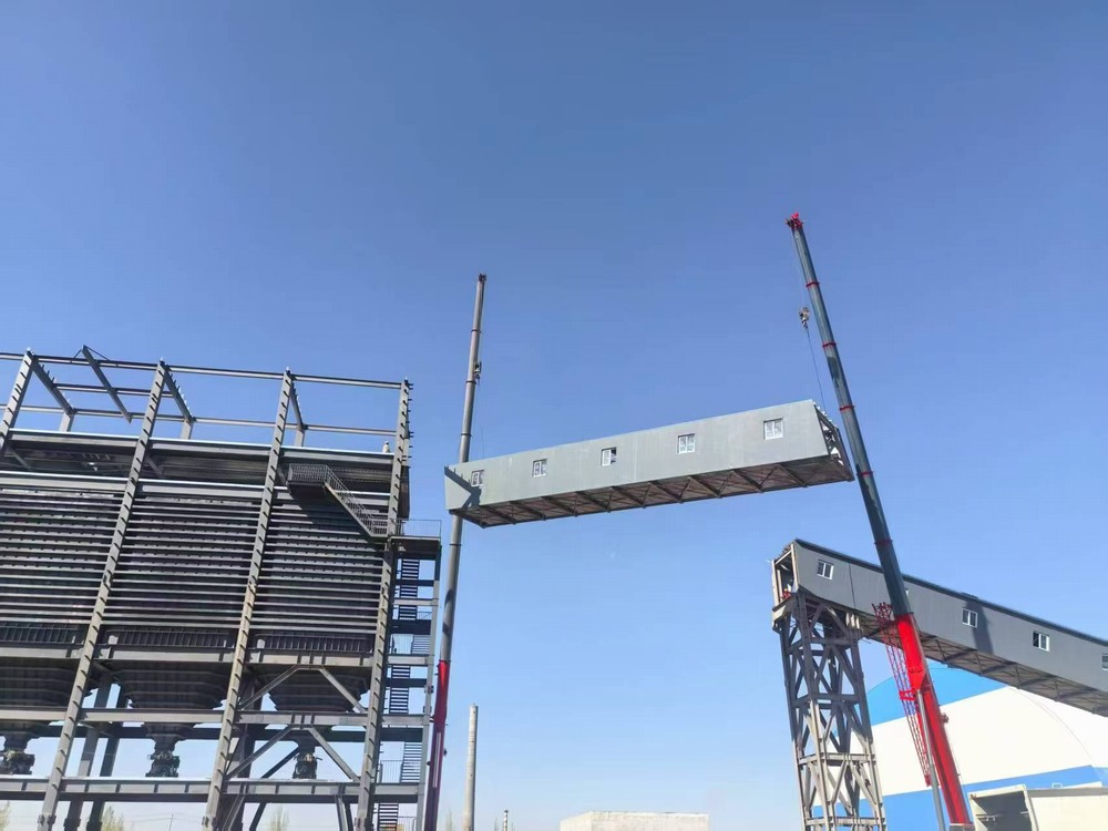 陜煤建設(shè)天工公司新疆第一項(xiàng)目部：雙機(jī)協(xié)作展絕技，棧橋凌空貫長(zhǎng)虹